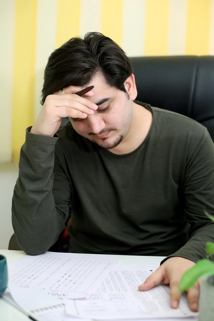 Entrepreneur struggling with business plan writing